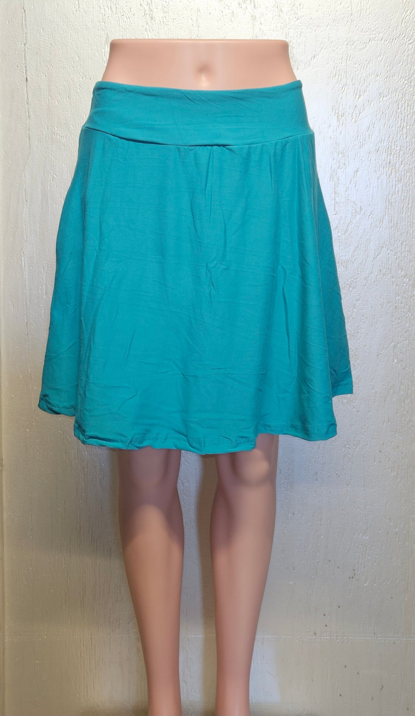 Turquoise skorts, capris and biker shorts with pockets