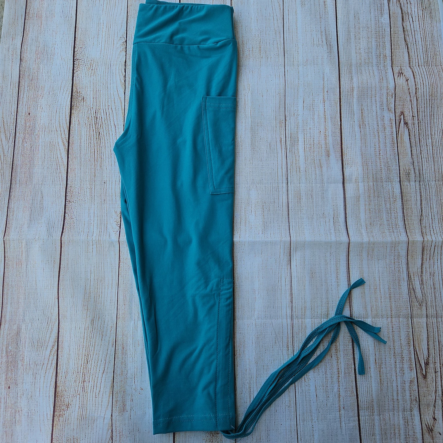 Aqua Solid side tie Capris