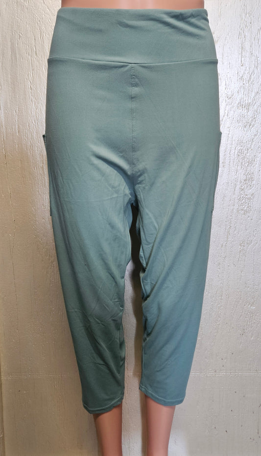 Sage green capris and biker shorts with pockets