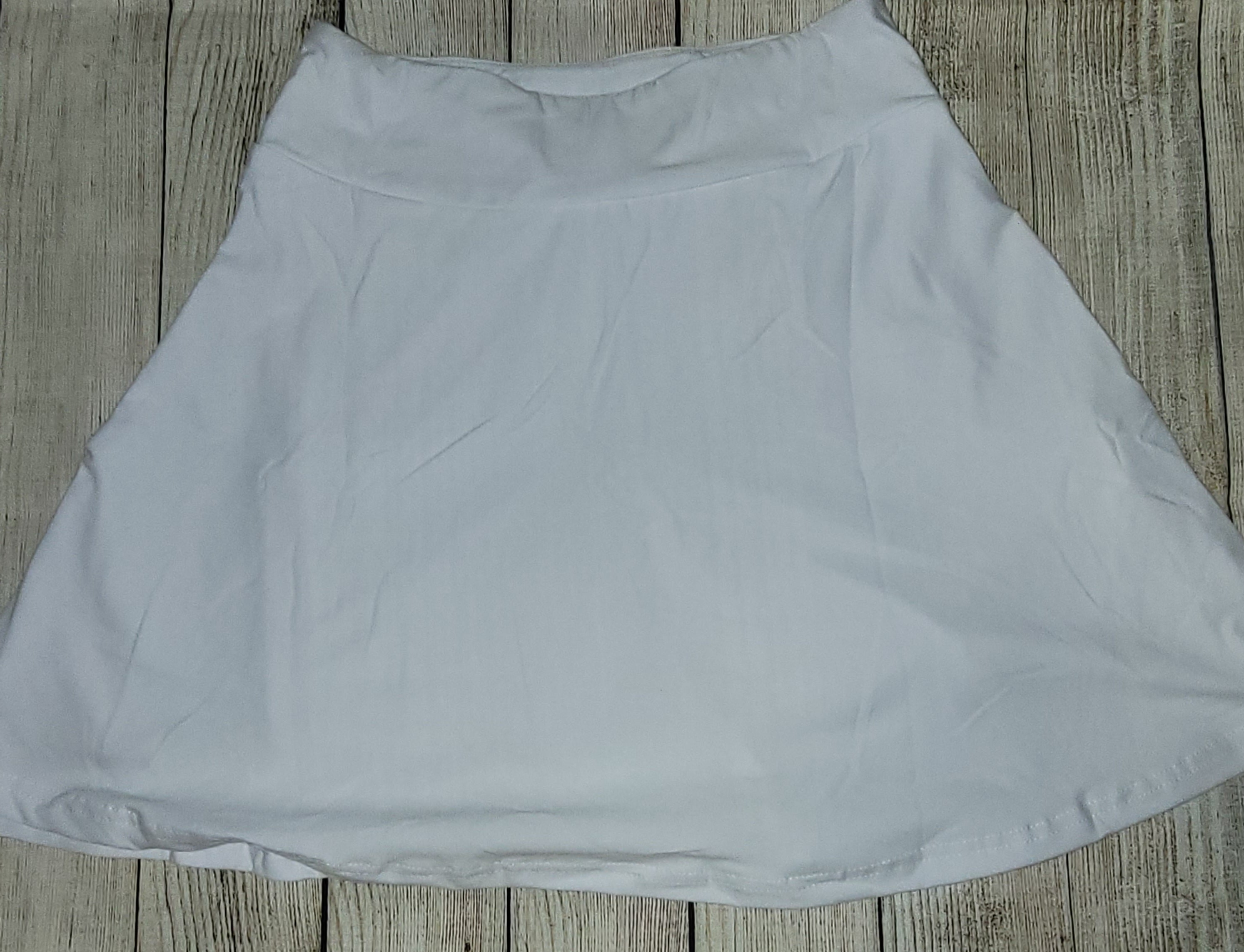 Solid white skorts with pockets