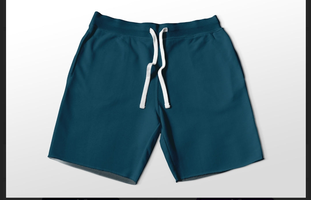 Solid dark teal jogger shorts with pockets 4" and 7" available